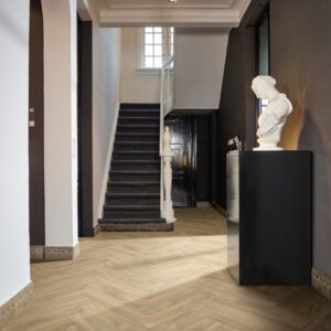 Dasos Sheet Vinyl – Oak Herringbone in a hallway