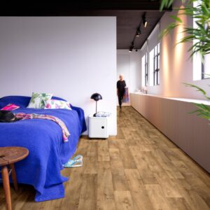 Kefi Sheet Vinyl – Welsh Timber in a bedroom