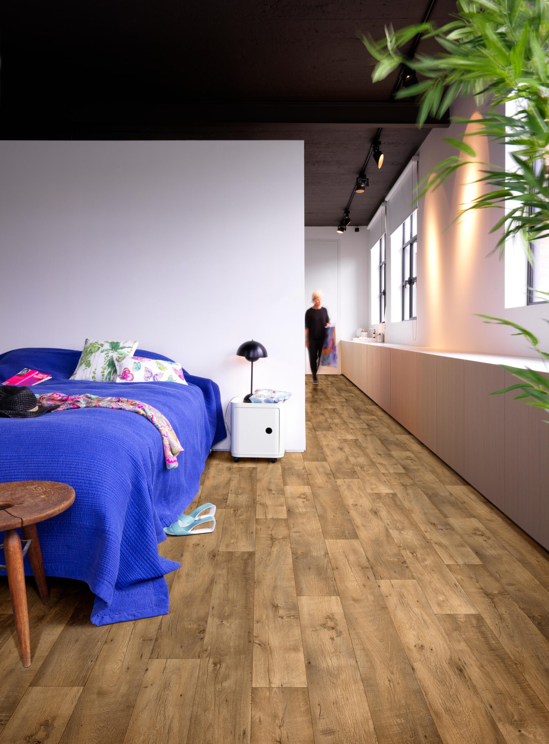 Kefi Sheet Vinyl – Welsh Timber in a bedroom