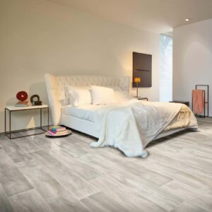 Kefi Sheet Vinyl – Hazed Pine in a bedroom