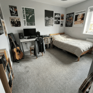 Abundance Flint Carpet in a bedroom